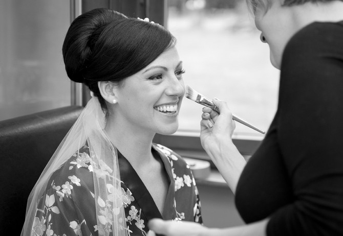 bride having make up done